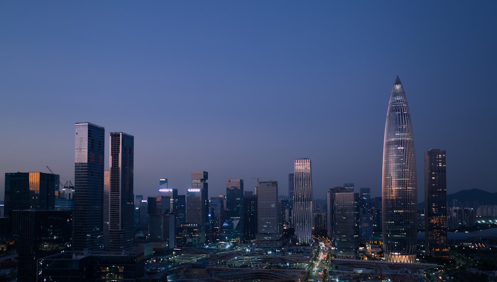 a view of a city at night from the top of a building