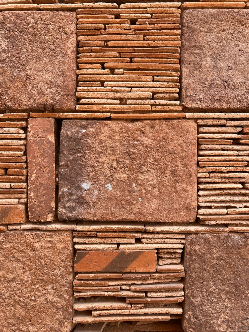um close up de uma parede de tijolos feita de tijolos