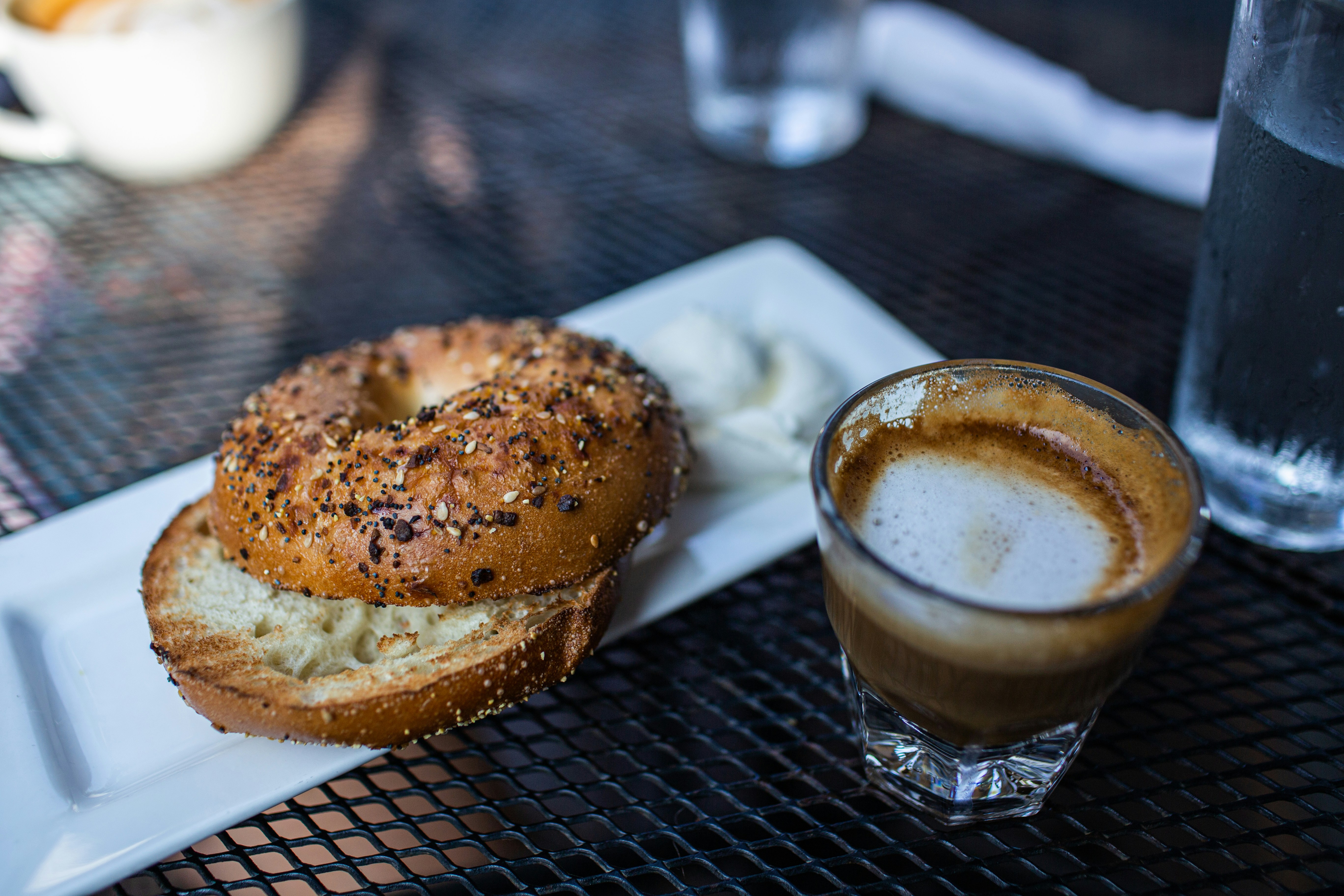 Bagel and coffee for breakfast (stock photo)