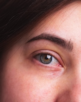 a close up of a person with a tooth brush in their mouth