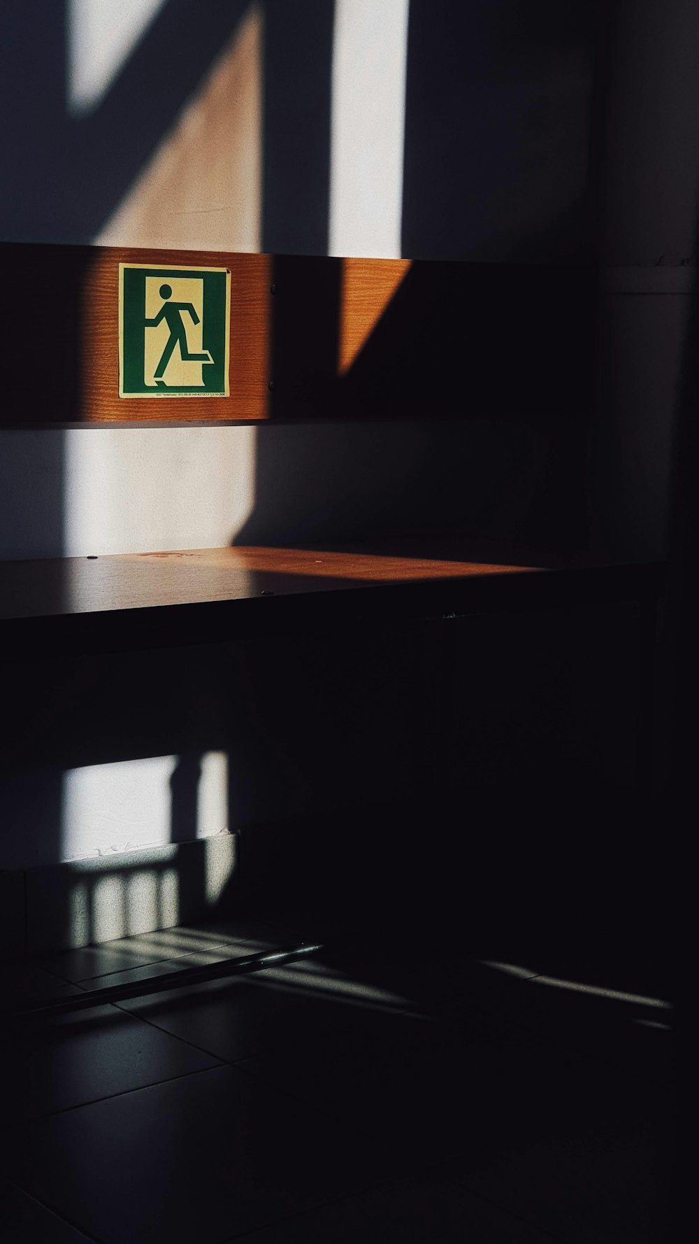 a table with a sign on it in a dark room