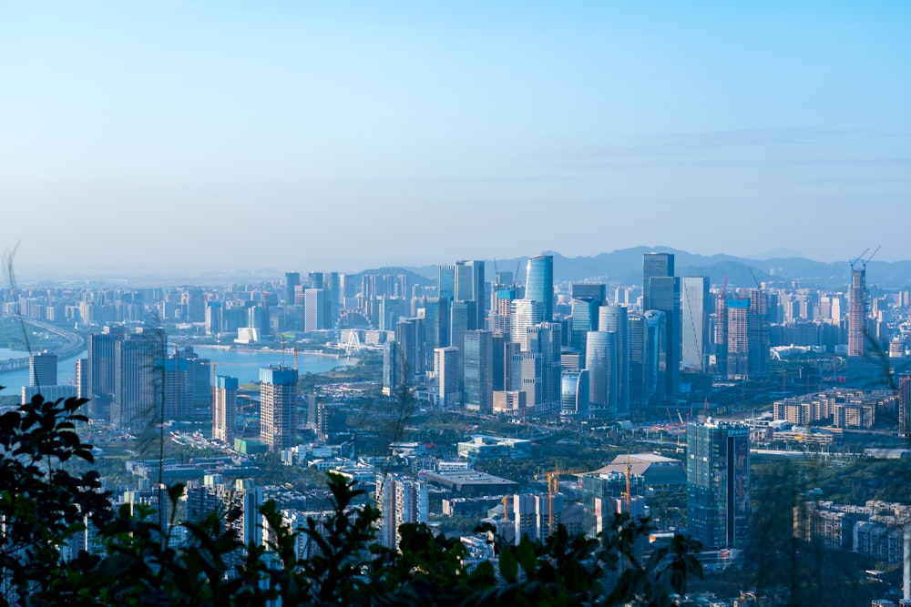 a view of a city from the top of a hill