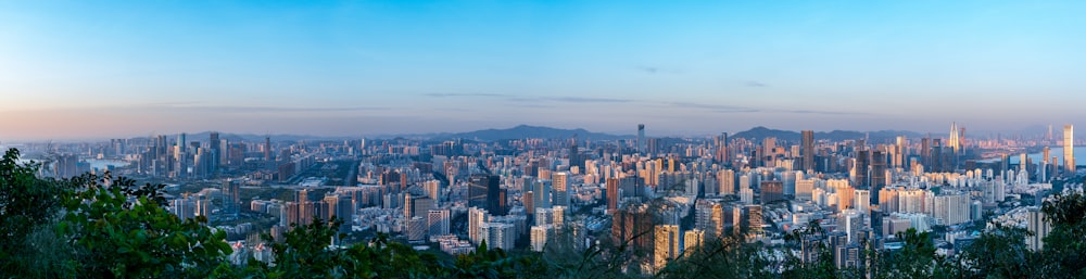 a view of a city from the top of a hill