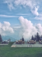 A scenic view of mountains with a family picnic setup.
