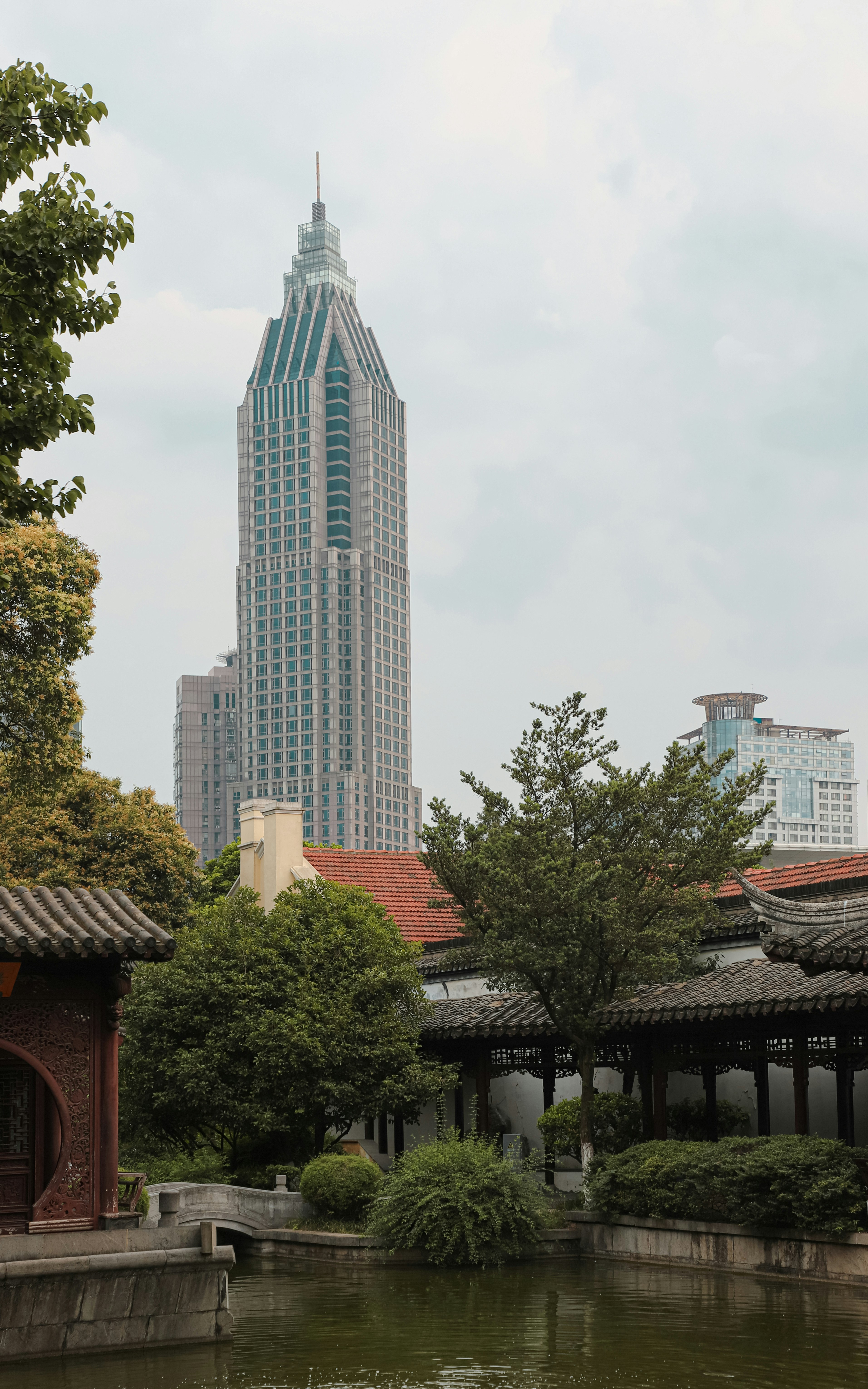 a large building with a tall tower in the background