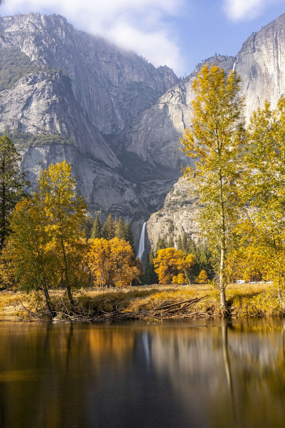 a lake surrounded by mountains and trees