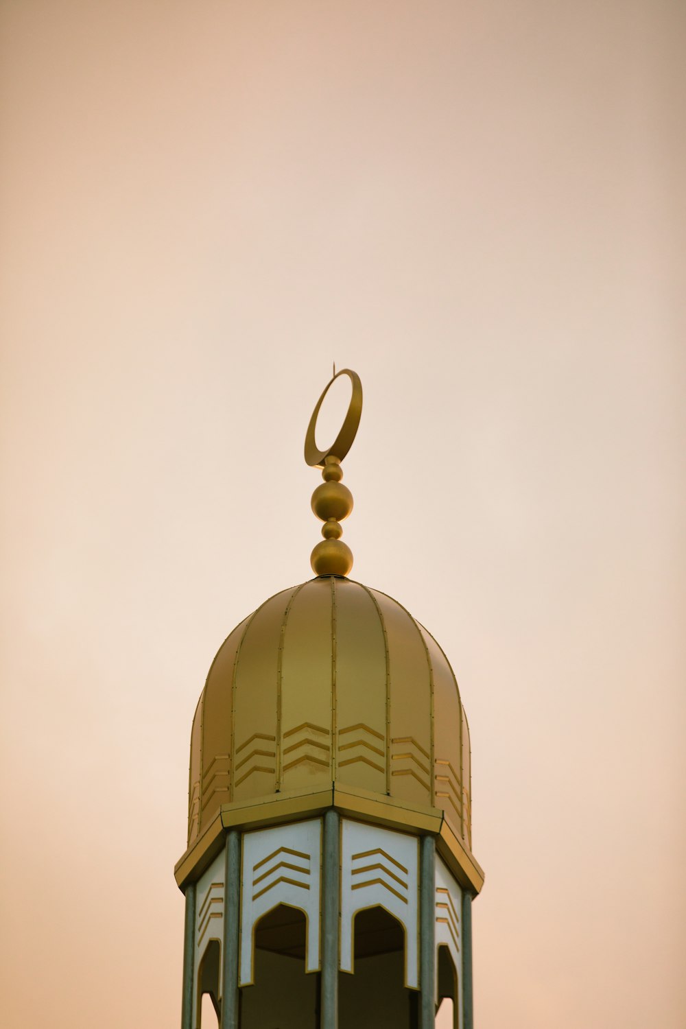 a tall tower with a clock on top of it