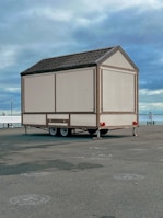 A spacious site cabin on wheels, ready for quick delivery and setup.