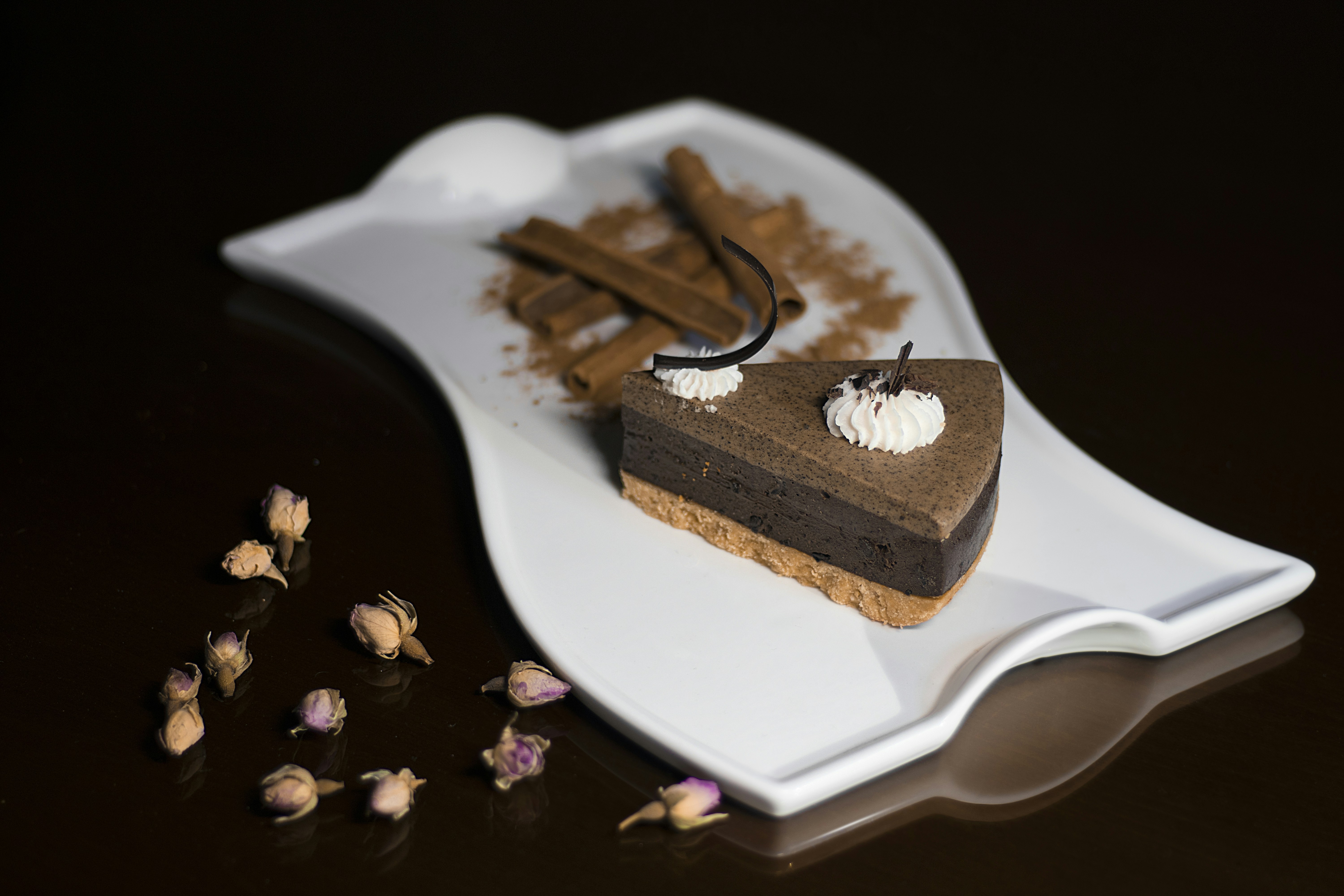 a piece of chocolate pie on a white plate, 