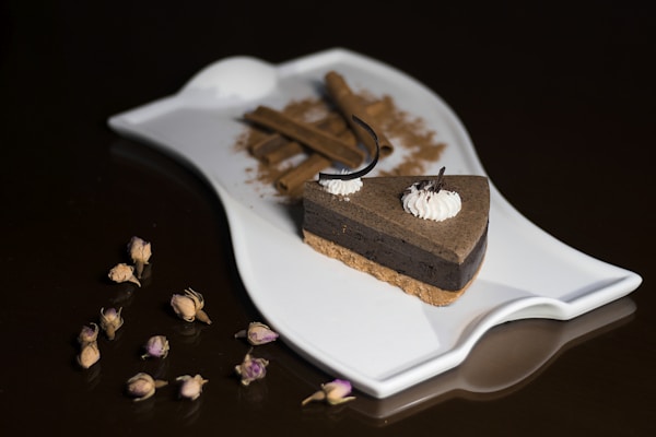 A piece of chocolate pie on a white plate