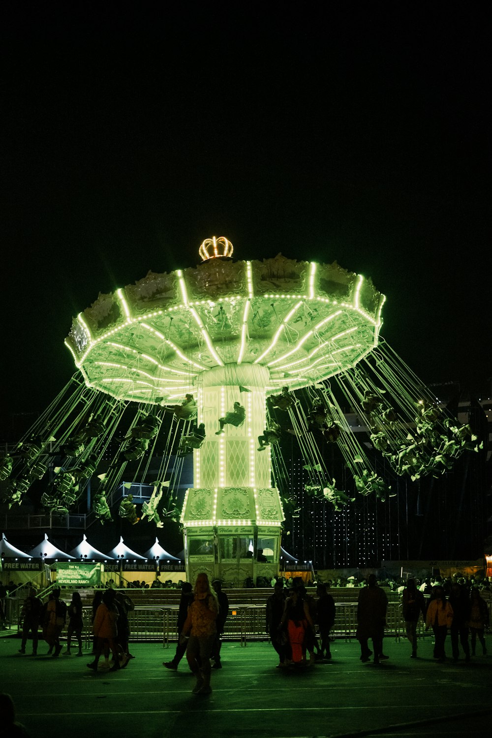 a merry go round lit up at night