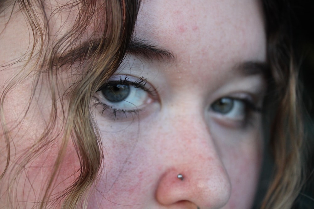 a close up of a person with a tooth brush in their mouth