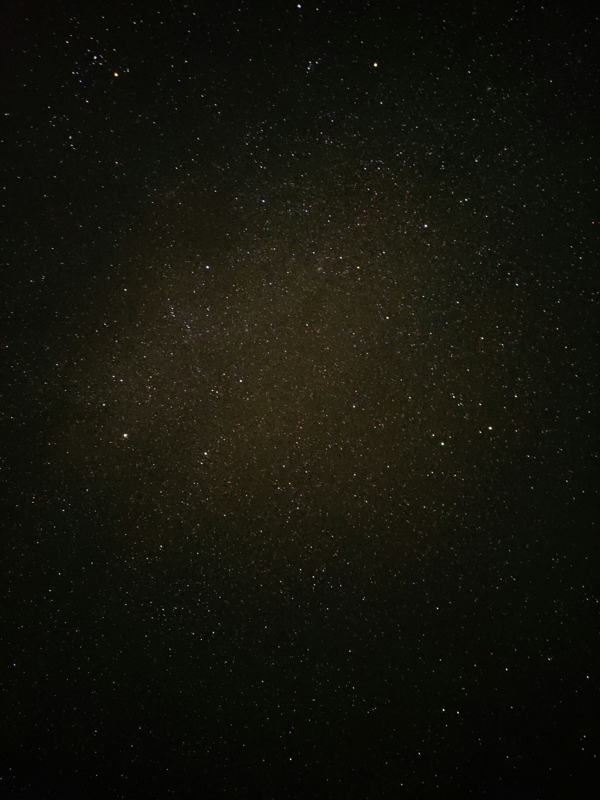 a night sky with stars and a black background