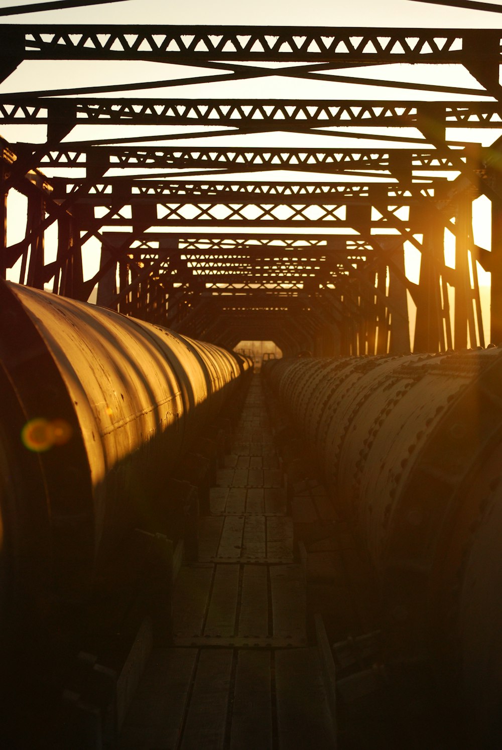 a train traveling over a bridge over water