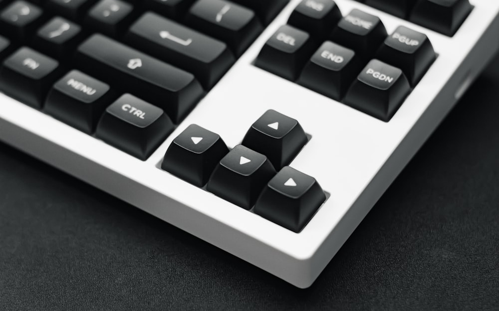 a close up of a black and white keyboard