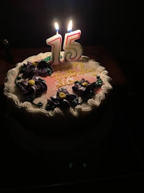 A beautifully decorated cake for a 15th birthday celebration.