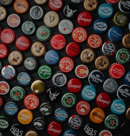 A cap with a fun, colorful logo representing Alcosyl’s love for alcoholic beverages.