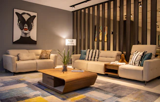 a living room with two couches and a coffee table
