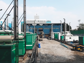 a factory with a lot of green and white machinery
