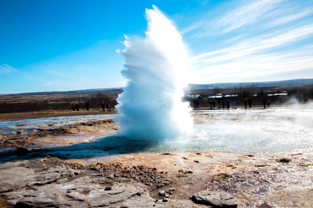 a large geyser spewing water into the air,