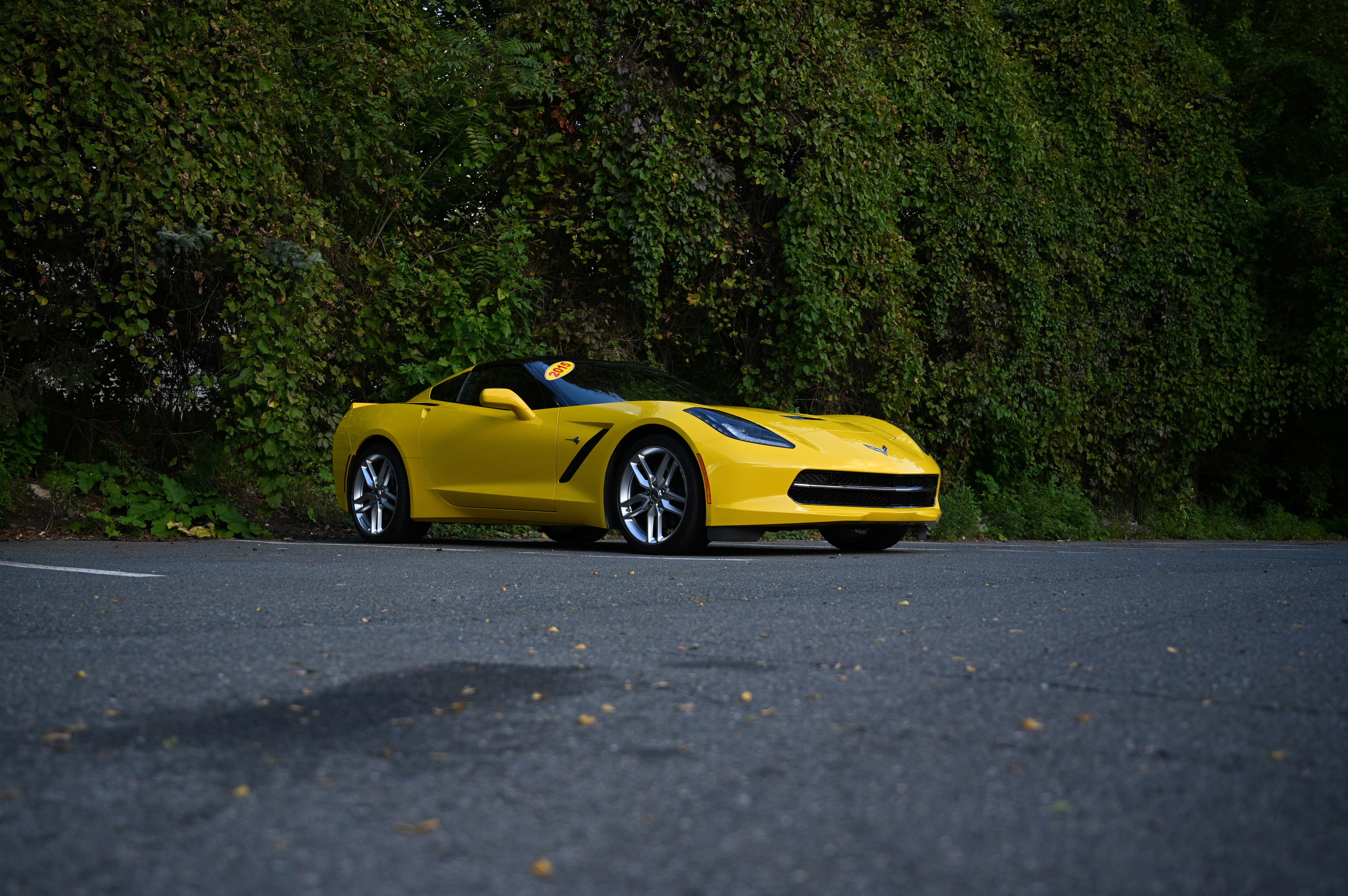 A yellow Chevrolet Corvette.