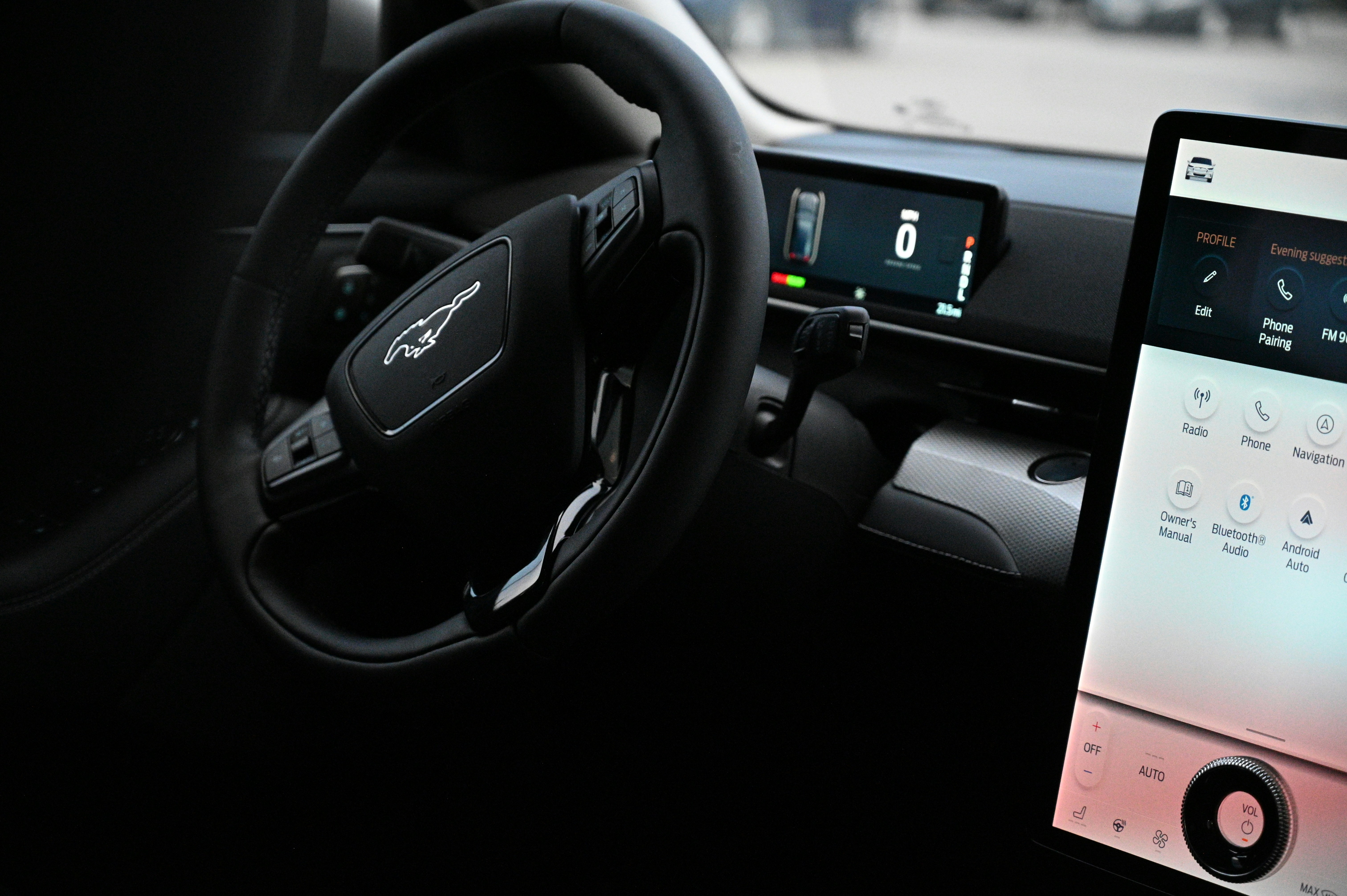 Tesla Model Y interior showing central touchscreen and minimalist dashboard