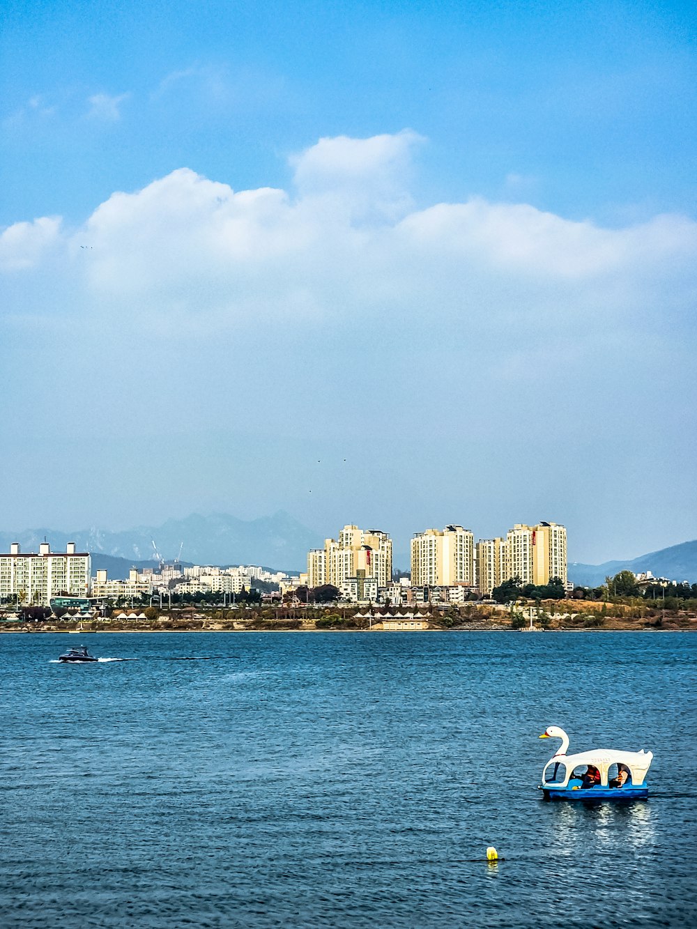 a boat floating on top of a large body of water