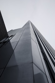 looking up at the side of a tall building