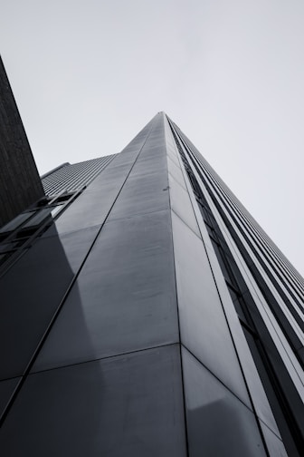 looking up at the side of a tall building