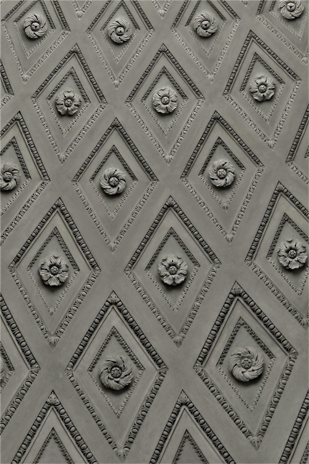 a black and white photo of a ceiling