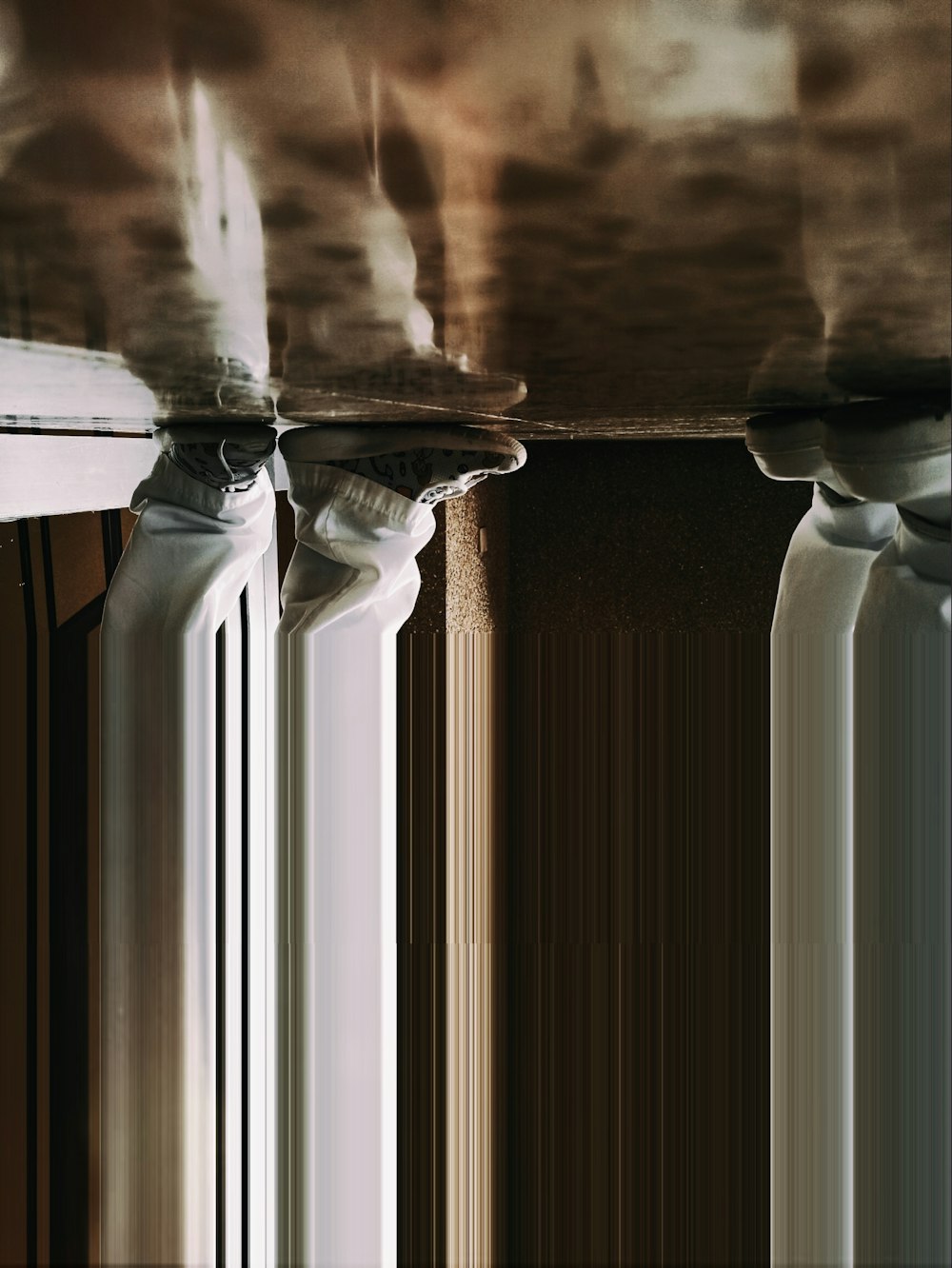 a close up of a window sill with a sky in the background