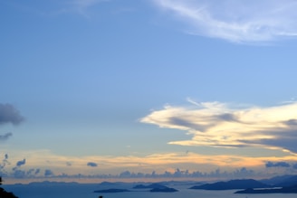 A panoramic view of the Atlantic Ocean at sunrise, hinting at the source of the fresh salmon.