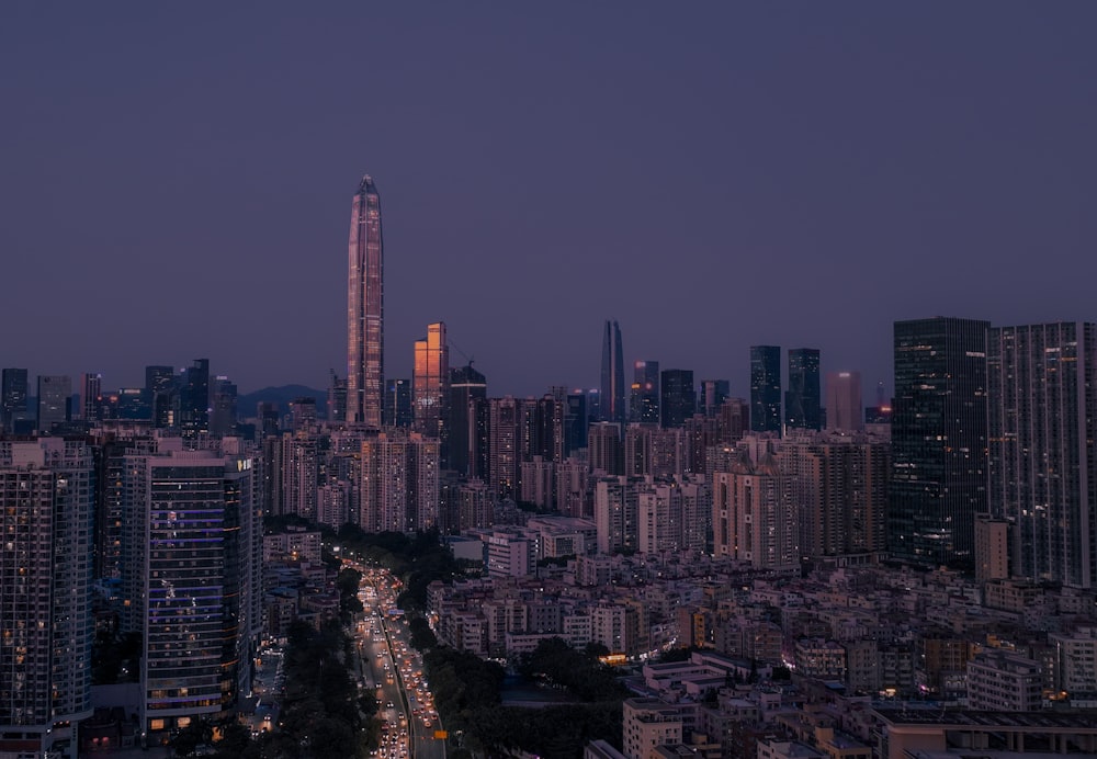 a view of a city at night from the top of a building