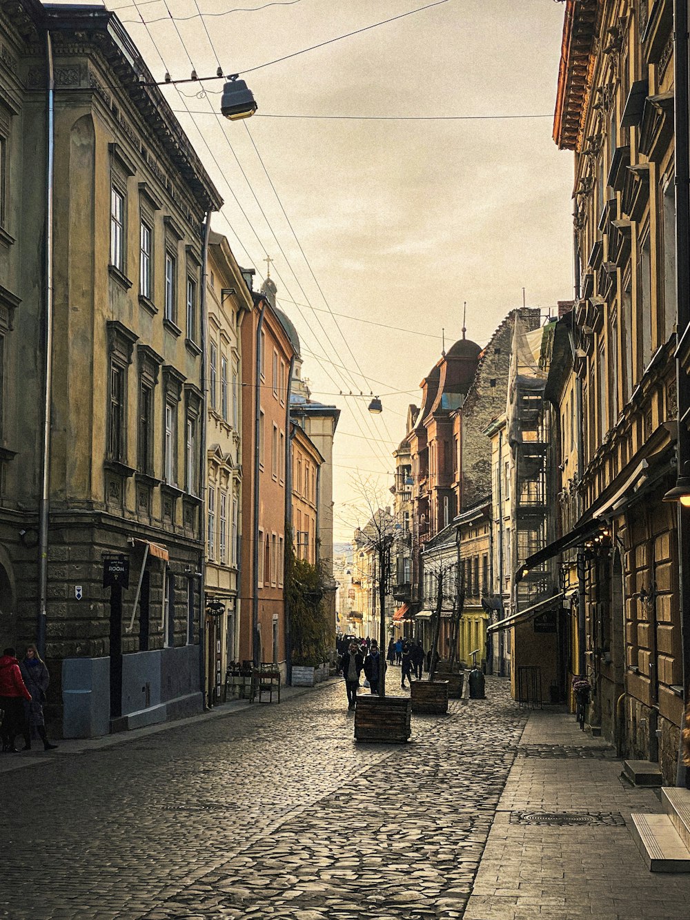 a cobblestone street in a european city