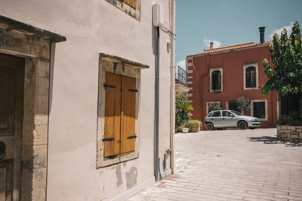 a car is parked in front of a house