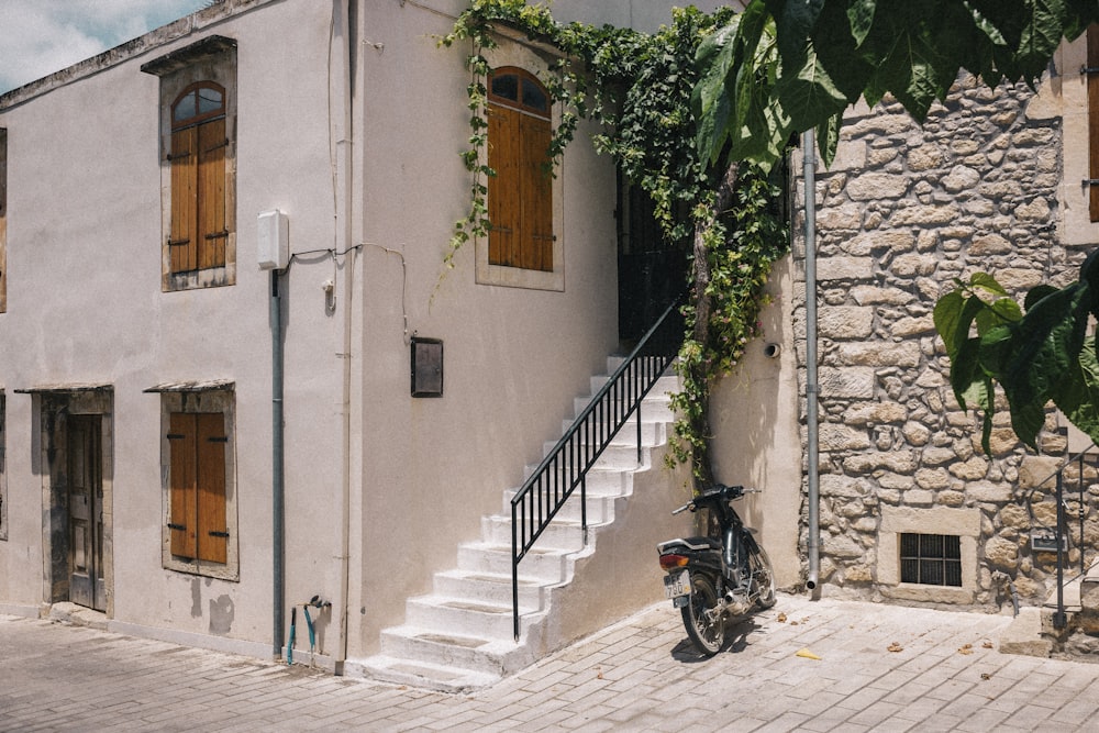 a motorcycle parked in front of a building