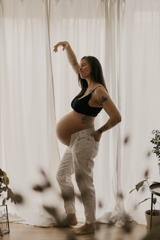 a pregnant woman dancing