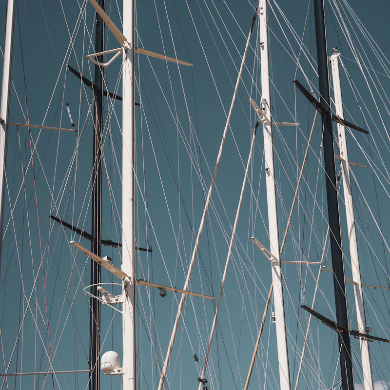Rigging against the sky on a moored sailing boat.