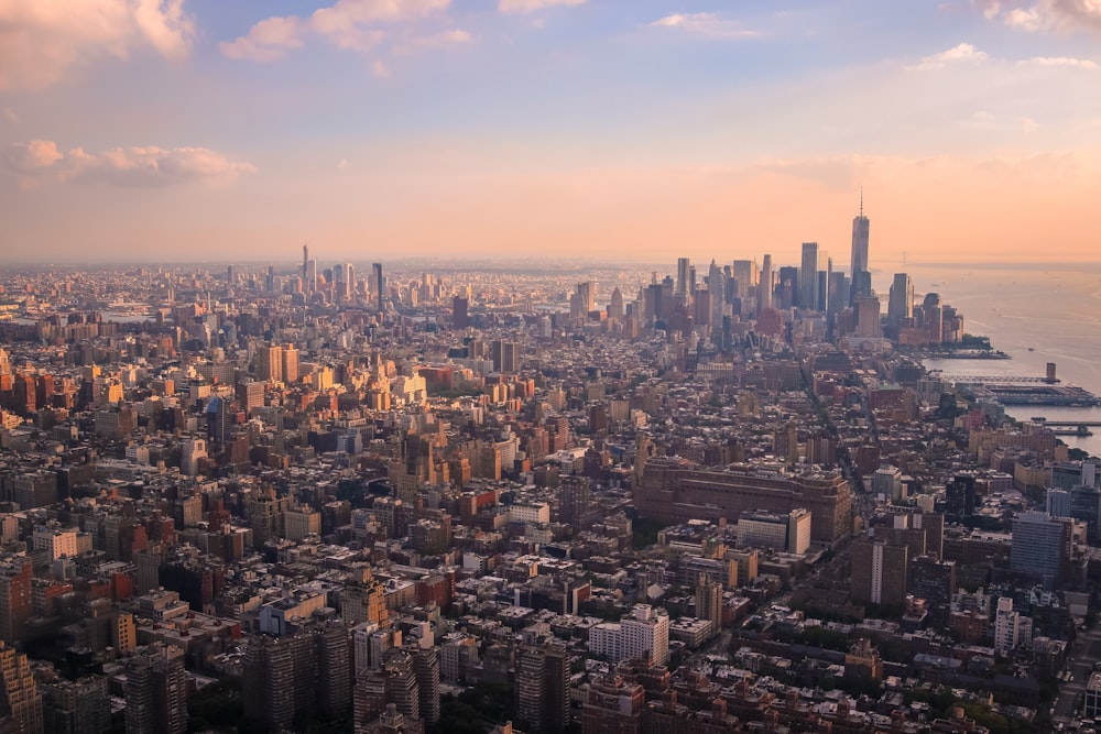 an aerial view of a city with tall buildings