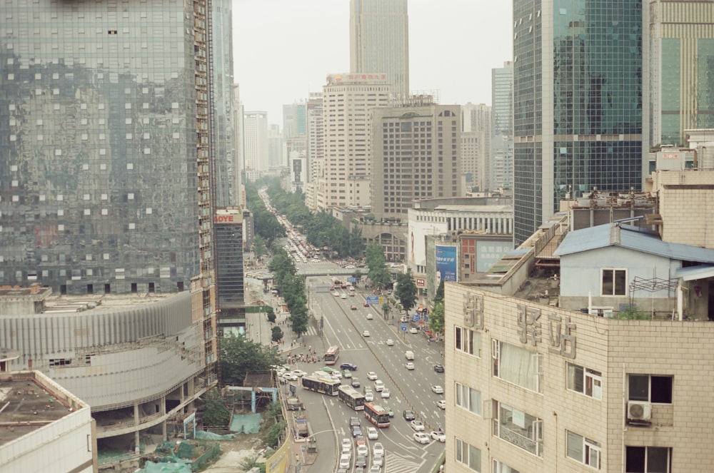 a view of a busy city street in the middle of the day