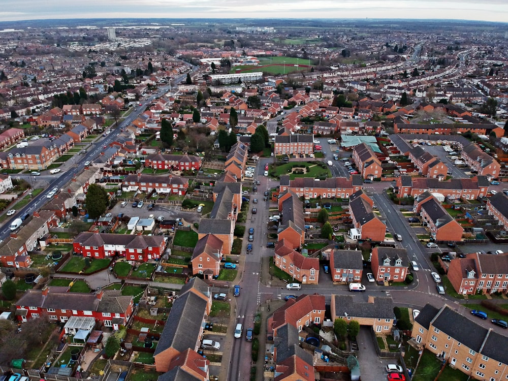 an aerial view of a city with lots of houses