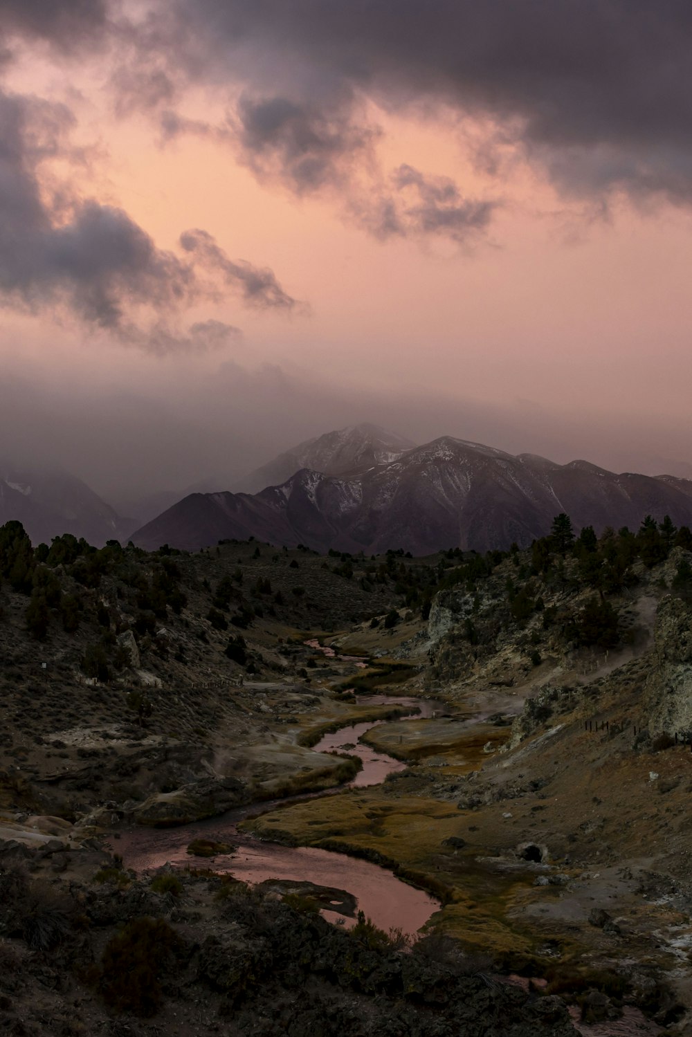 a mountain range with a river running through it