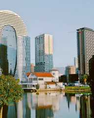 a body of water surrounded by tall buildings