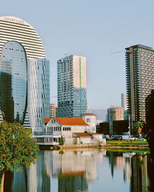 a body of water surrounded by tall buildings