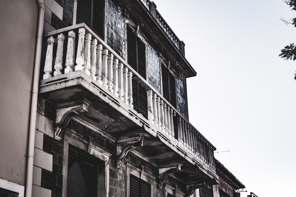 an old building with a balcony and balconies