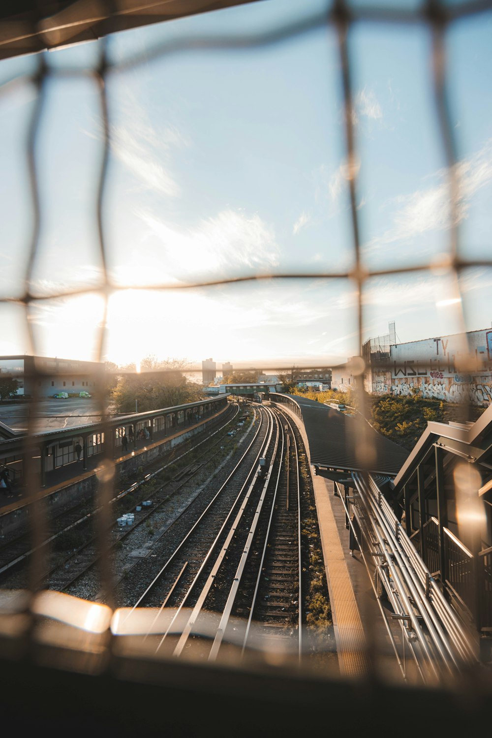 a view of a train track through a window