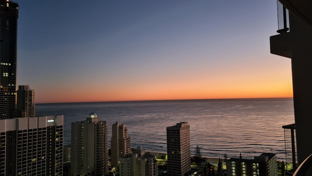 a view of the ocean from a high rise building