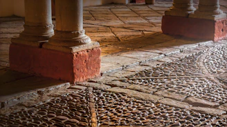 Close-up of intricate stone textures and warm lighting creating a mystical atmosphere.