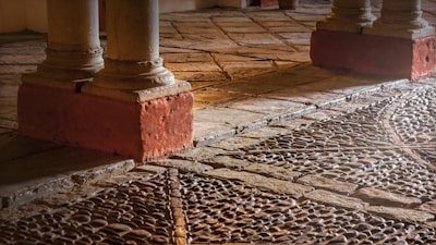 Close-up of elegant stone floor tiles with natural textures in a cozy living room setting