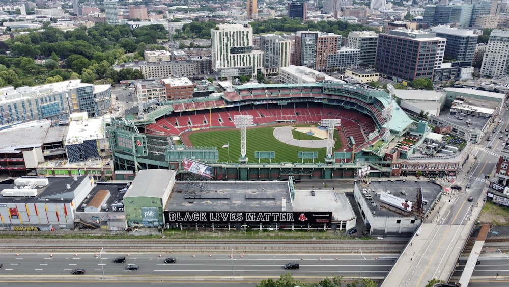an aerial view of a baseball stadium in a city